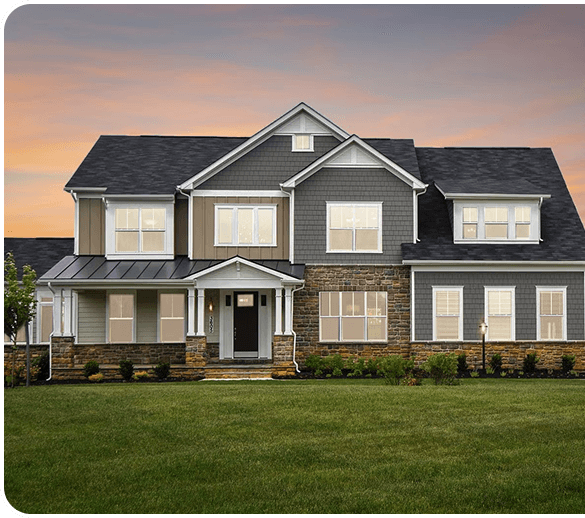 Modern two-story house with stone veneer and gray siding